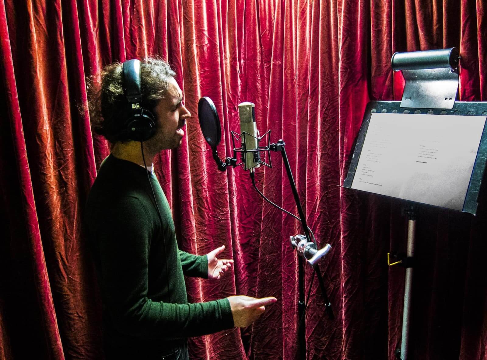 Man singing into microphone