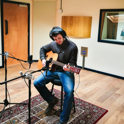 Man playing acoustic guitar